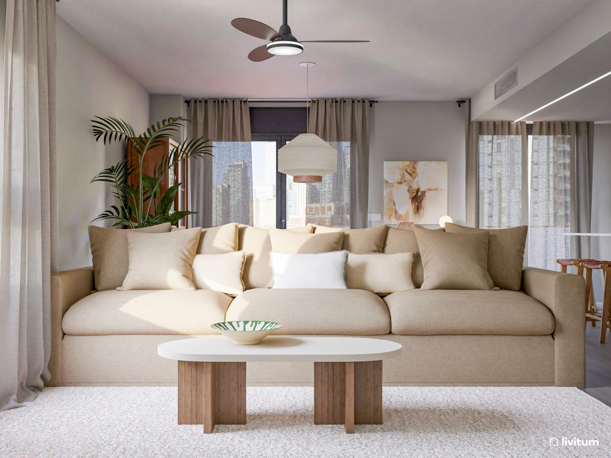 Acogedor salón con comedor redondo, cocina abierta y plantas decorativas