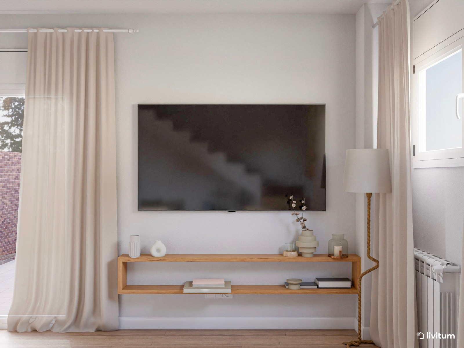 Amplio y luminoso salón en tonalidades de blanco y texturas acogedoras