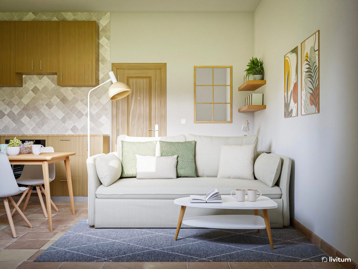 sal&oacute;n con cocina integrada, sof&aacute; peque&ntilde;o y mesa de centro
