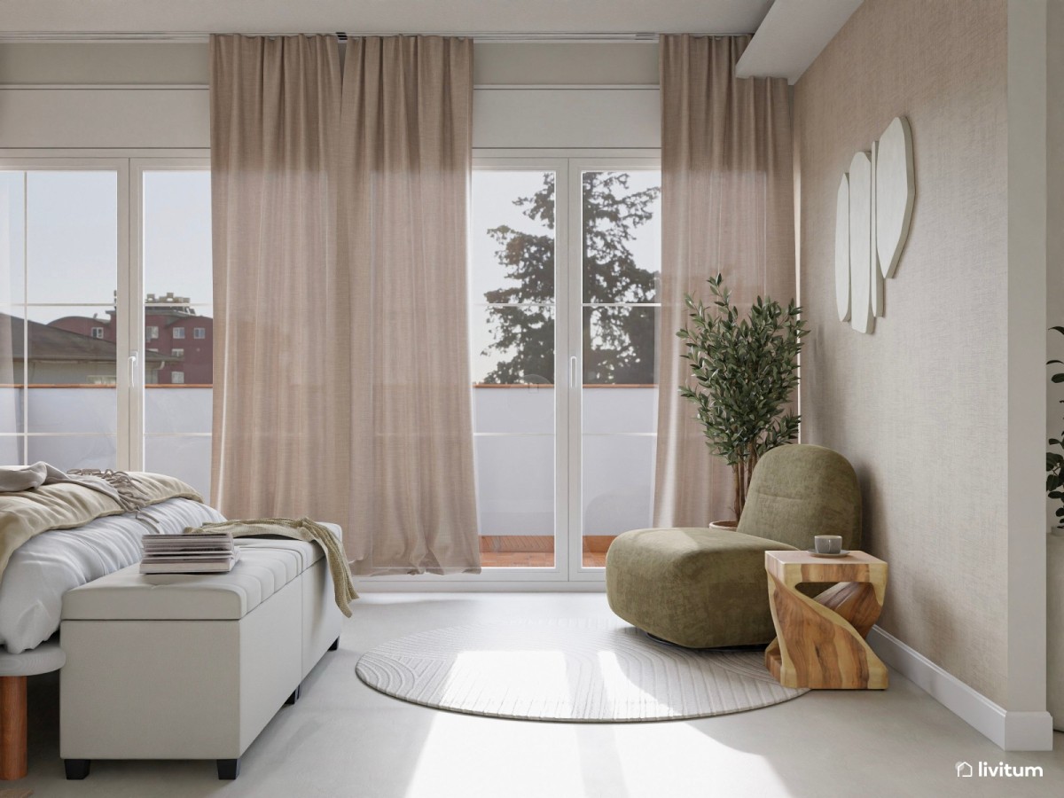 dormitorio en tonos claros, banco y sill&oacute;n verde