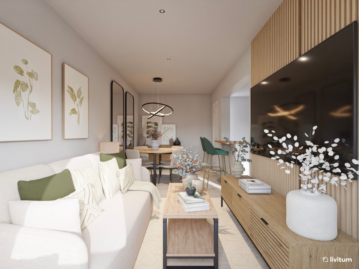 sal&oacute;n comedor estrecho con cocina integrada en tonos verde 