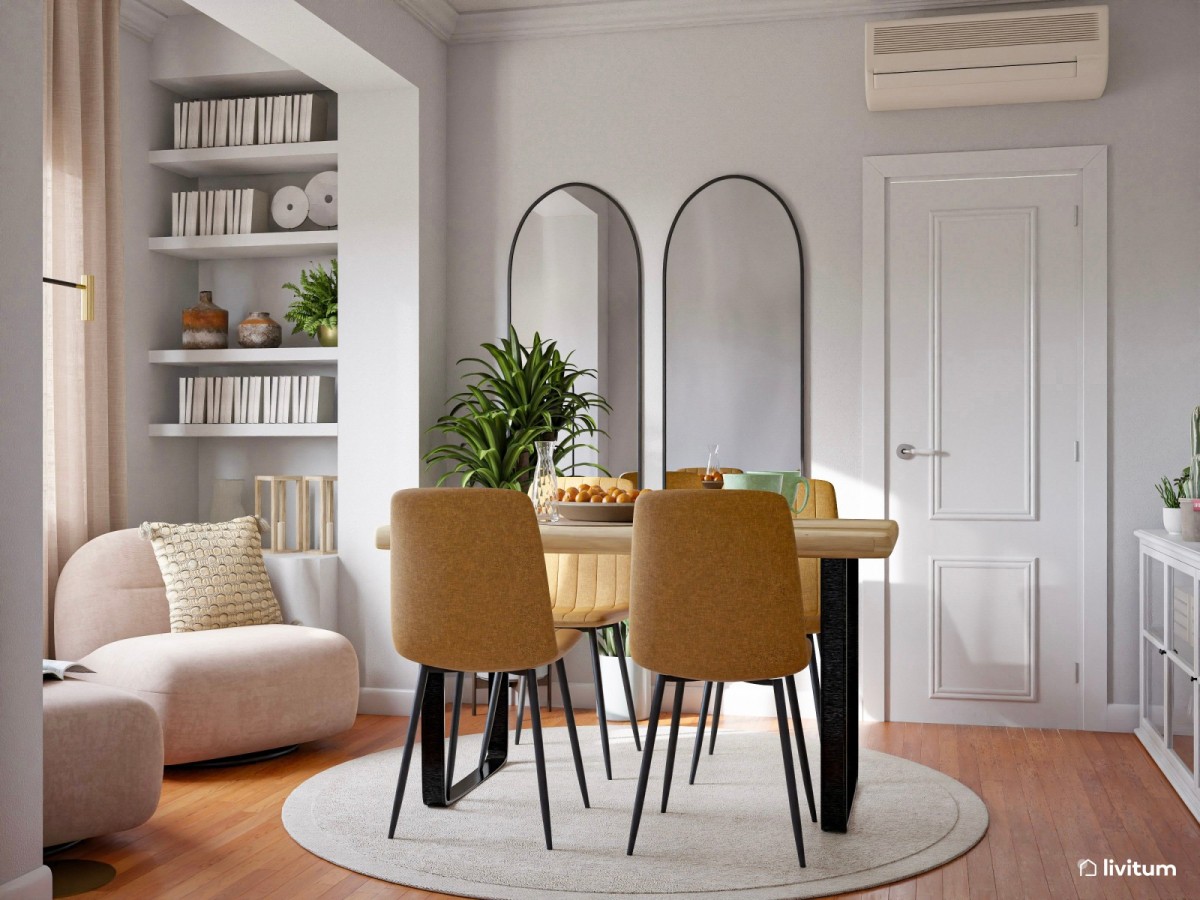 comedor en tonos claros y detalles mostaza, mesa y dos espejos ovalados