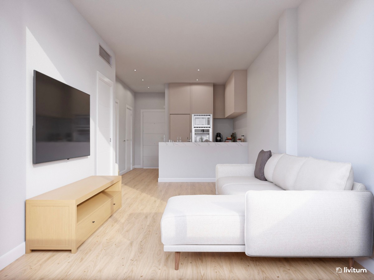 salón con cocina integrada vacío y sofá en L