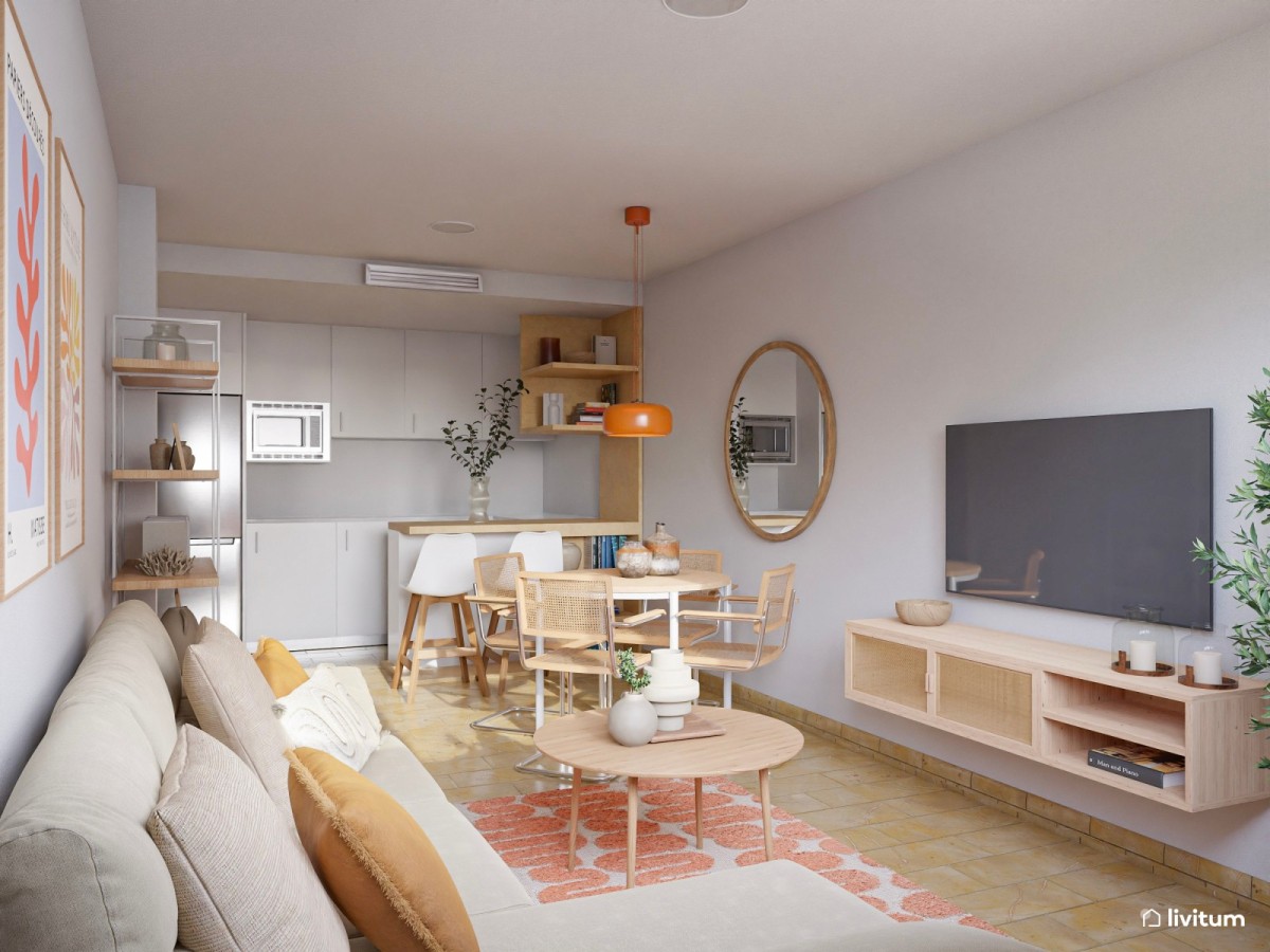 sal&oacute;n comedor con cocina abierta, mesa de comedor circular  y sof&aacute; con mesa de centro