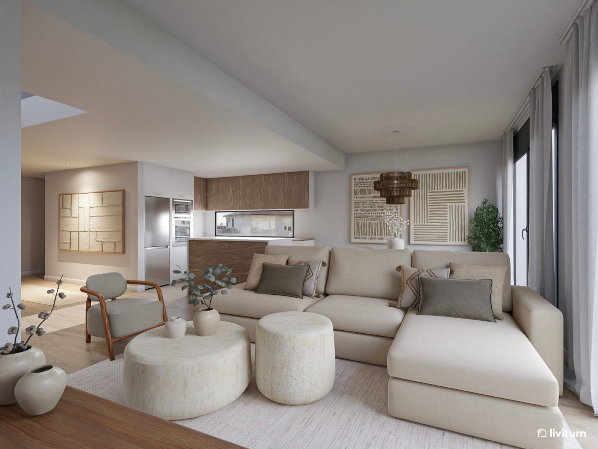 sal&oacute;n comedor con cocina integrada, sof&aacute; en L, sill&oacute;n y mesas de centro de piedra