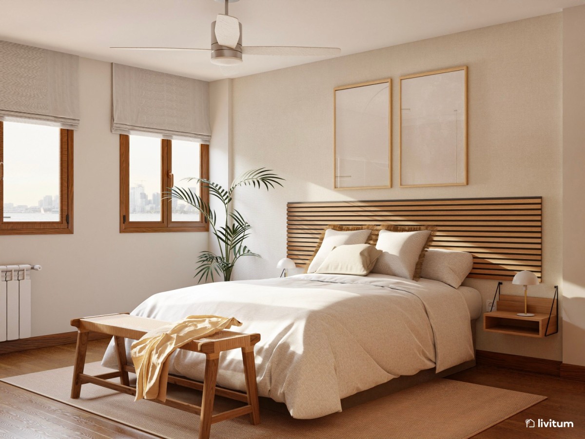 dormitorio en tonos claros, listones de madera como cabecero y cuadros grandes