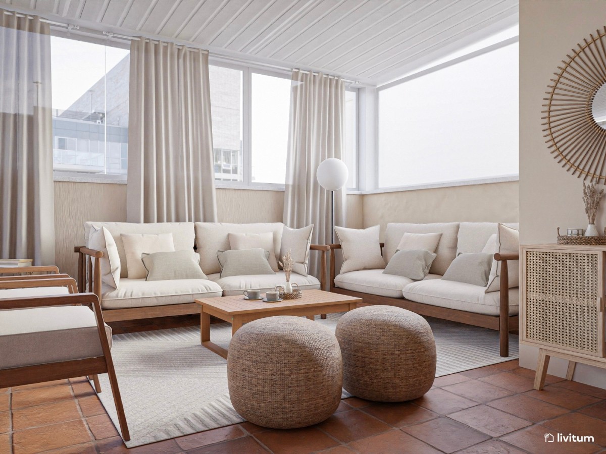 terraza en tonos claros, zona de descanso con sof&aacute;s, mesa de centro y cortinas