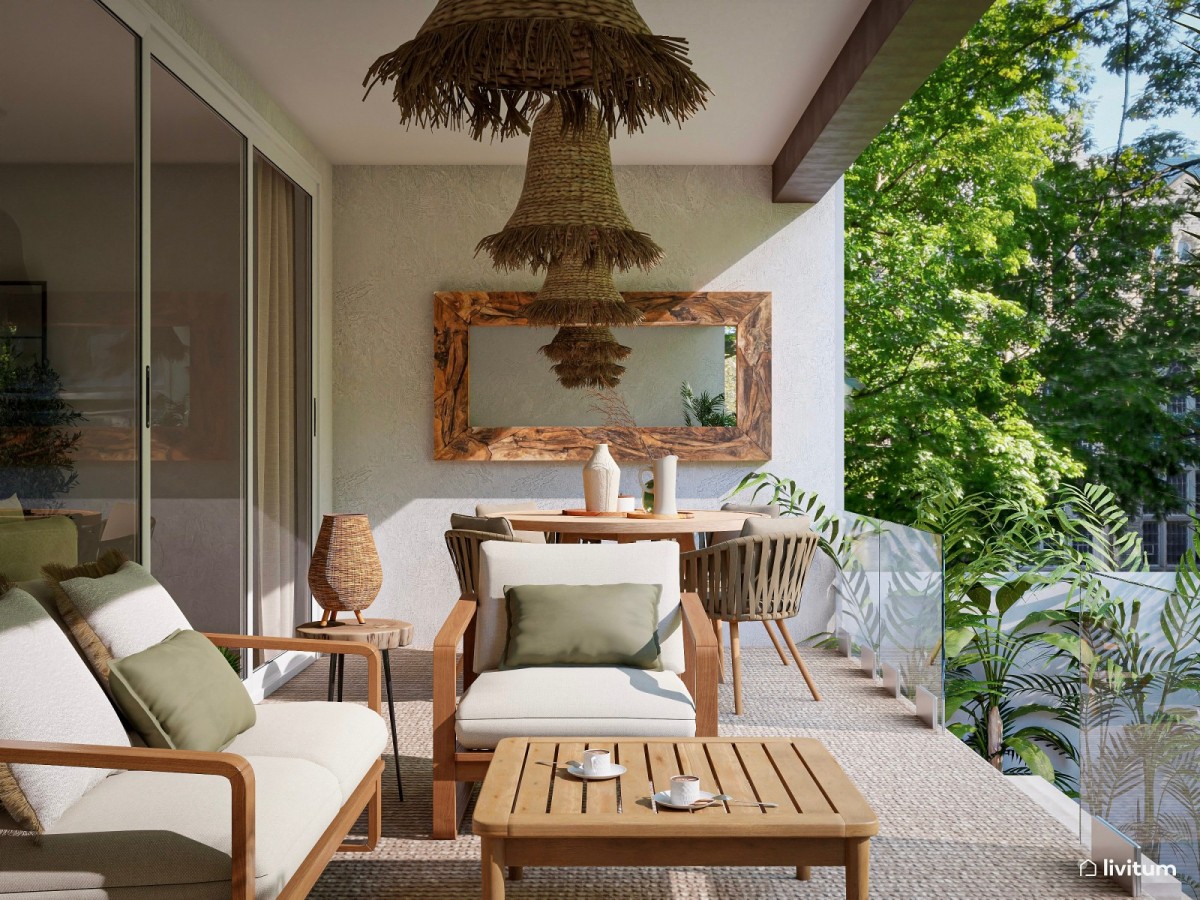 terraza de madera oscura, zona de chill out con sof&aacute;s y mesa de comedor redonda