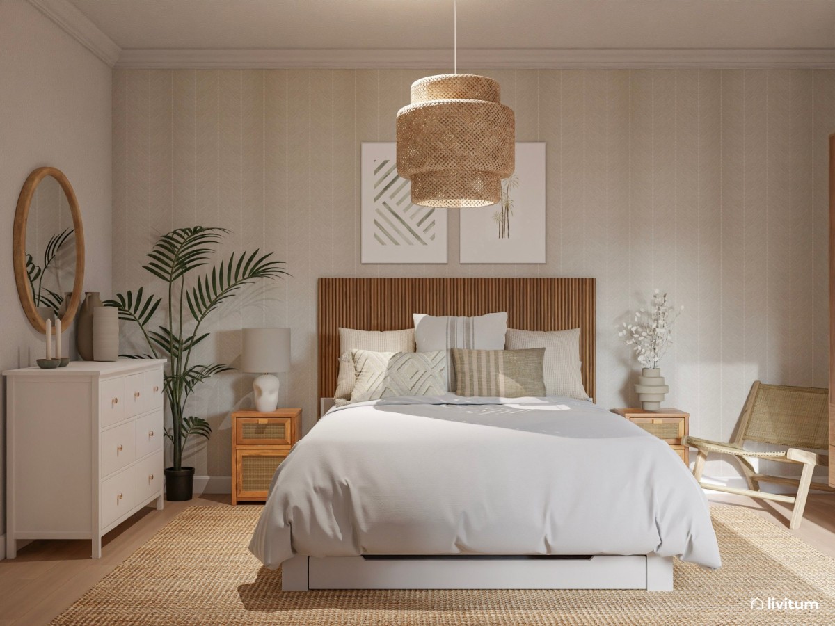 dormitorio con papel pintado, cama de matrimonio y c&oacute;moda