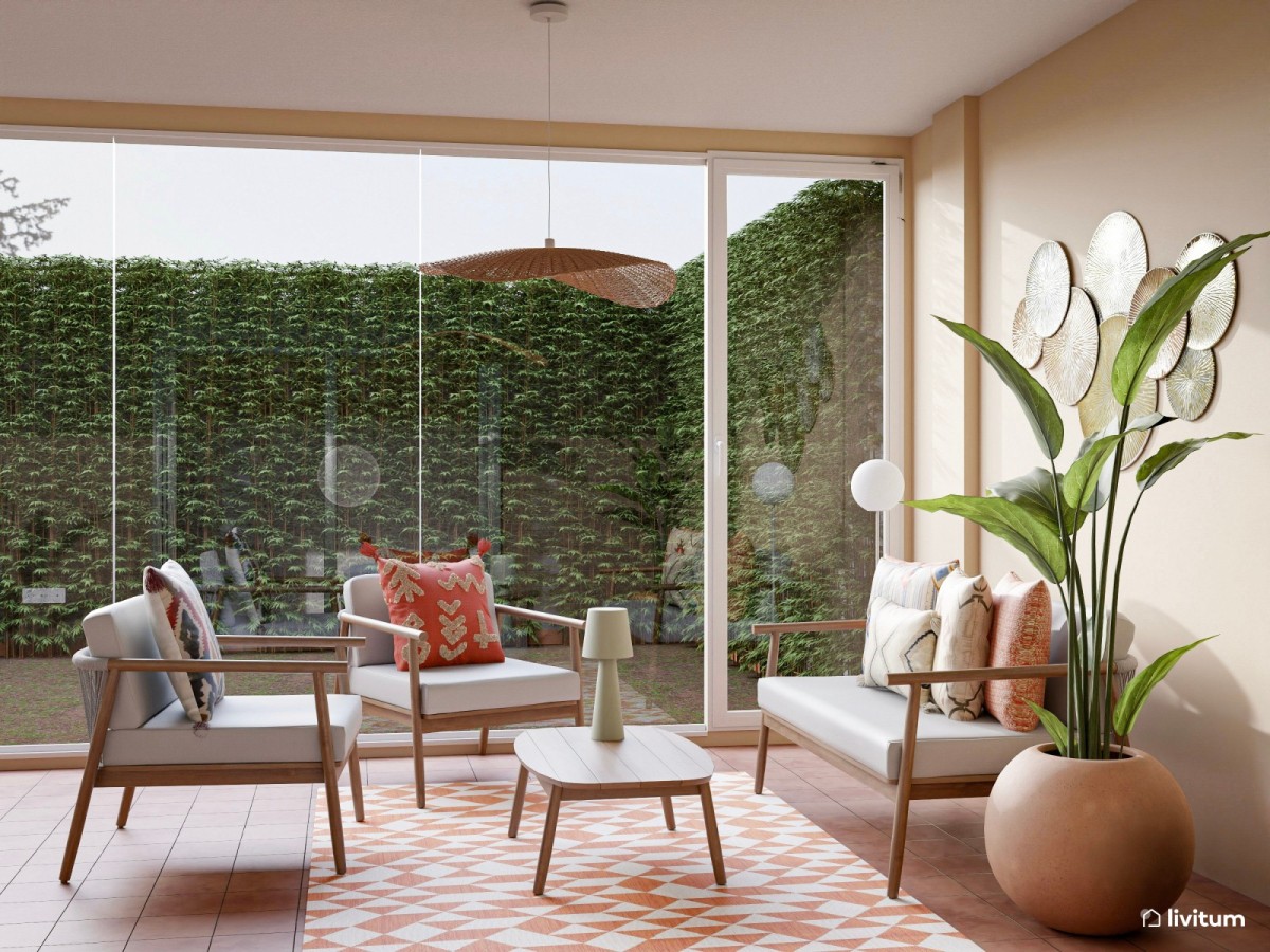 terraza en tonos c&aacute;lidos, zona de descanso con sof&aacute;s y mesa de centro