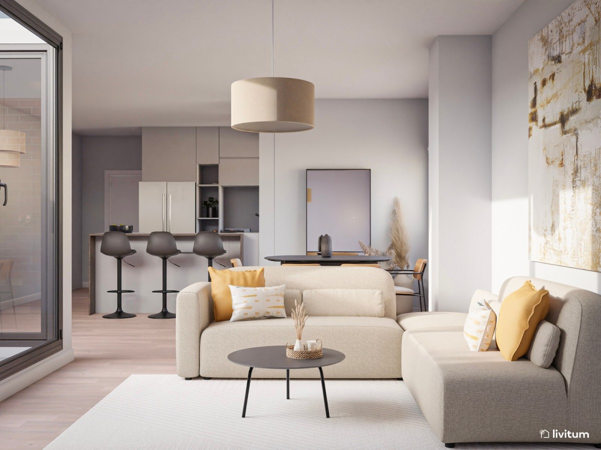 sal&oacute;n con cocina abierta en tonos neutros y detalles en mostaza y negro
