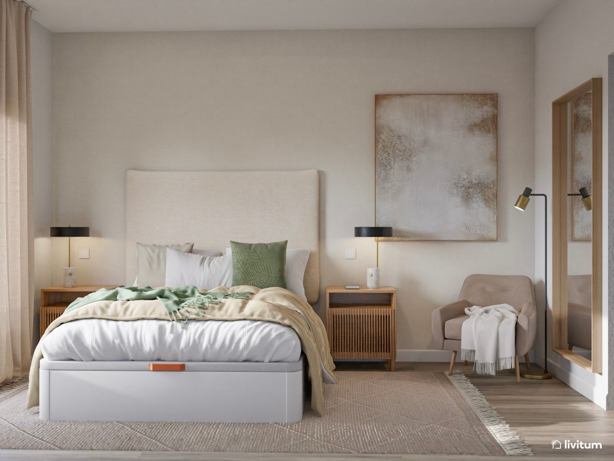 dormitorio en tonos neutros, cama, mesas de noche y butaca en zona de lectura