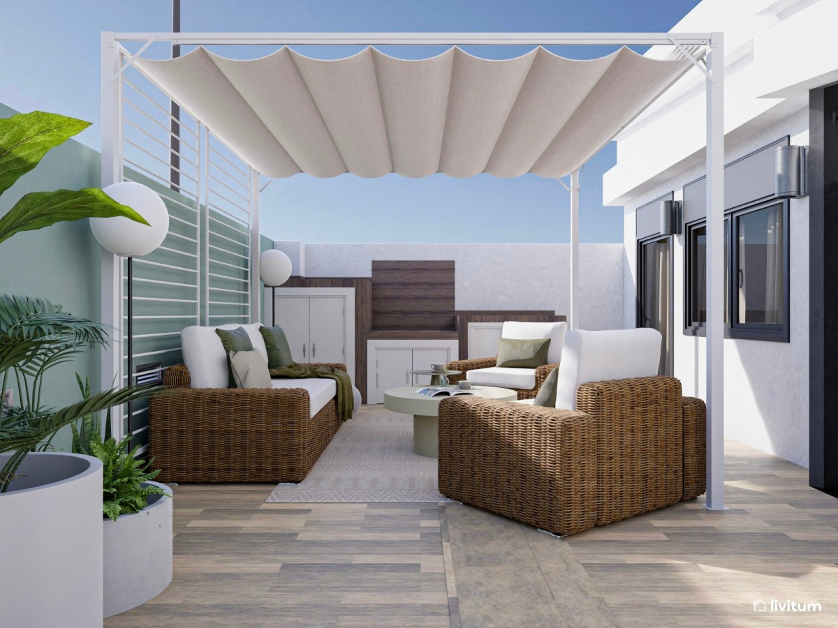 terraza en tonos madera, sof&aacute;s y toldo