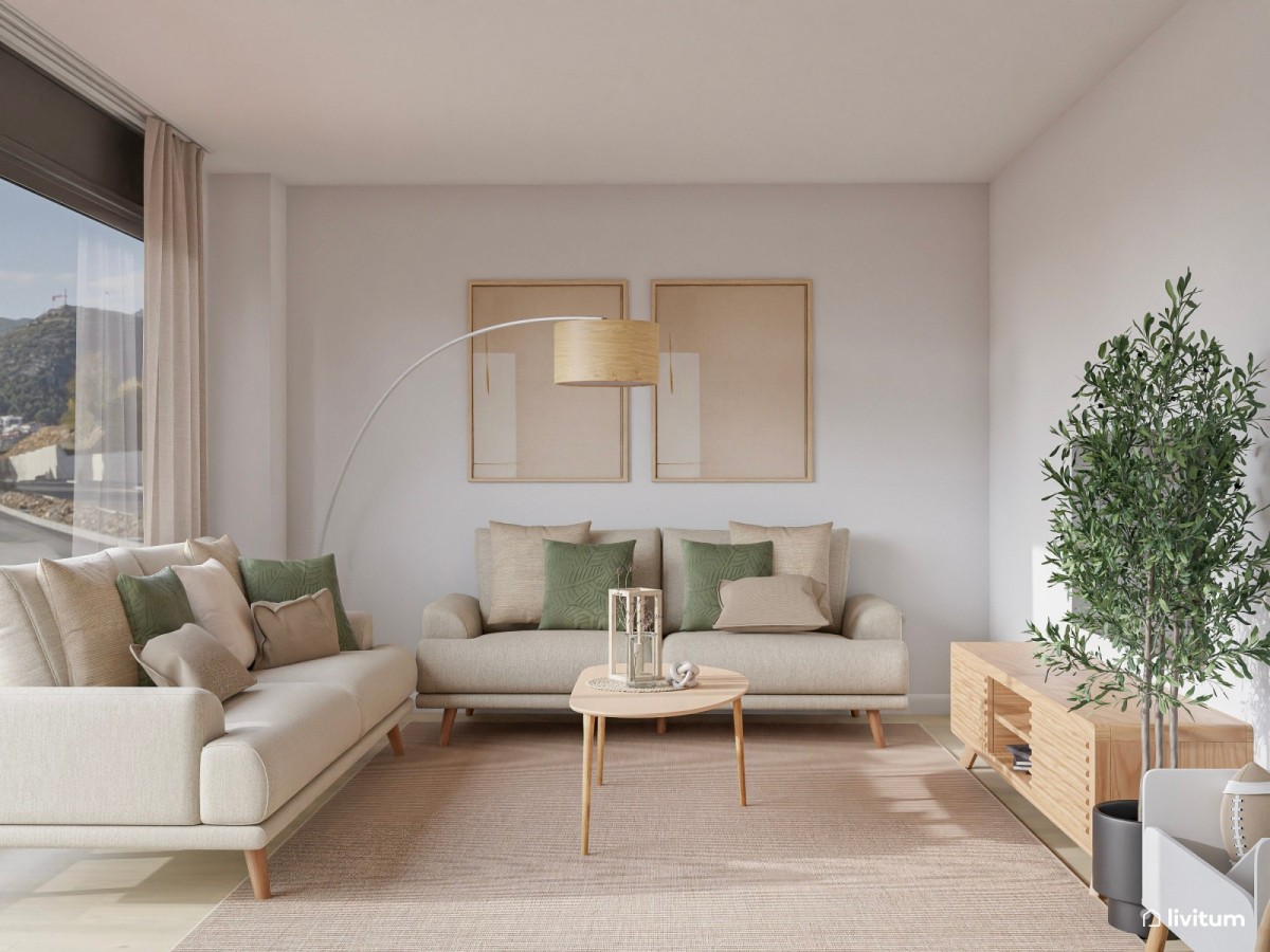Sal&oacute;n en tonos claros con dos sof&aacute;s y detalles en verde