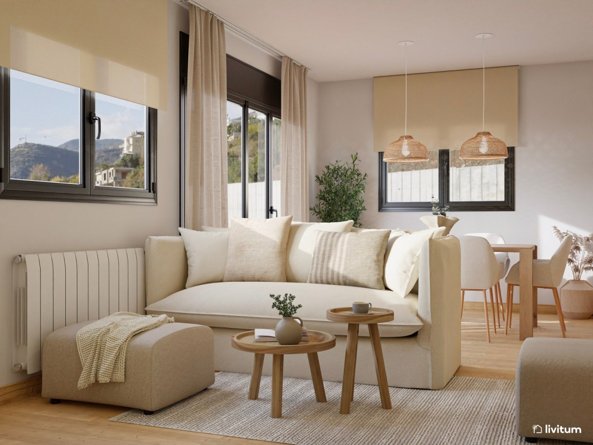 sal&oacute;n peque&ntilde;o en tonos claros, sof&aacute; y puff y mesitas de centro de madera