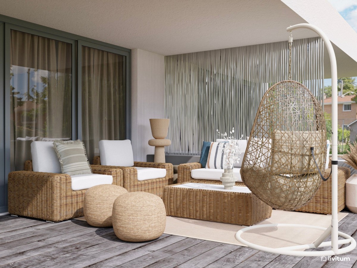 terraza en tonos madera, sof&aacute;s y silla colgante