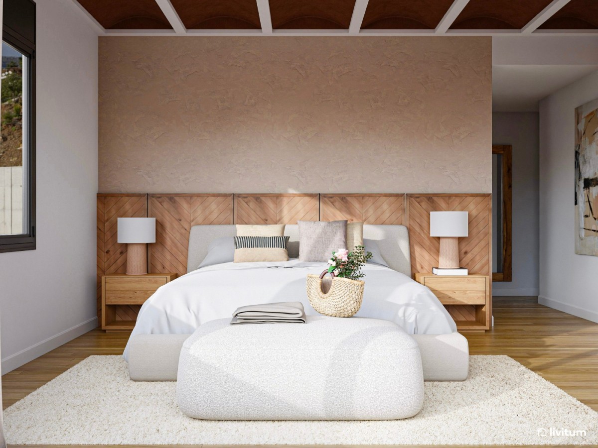 dormitorio con cabecero de madera, cama de matrimonio y mesas de noche