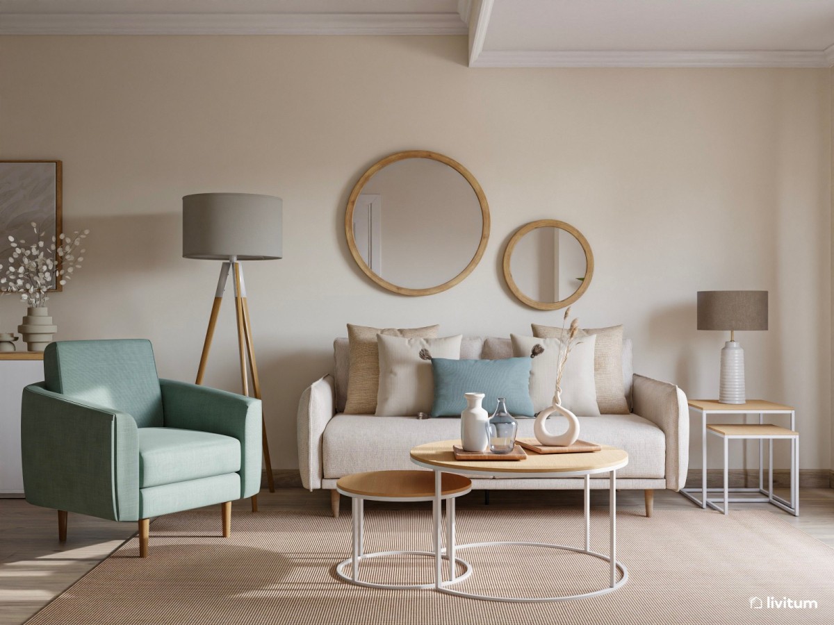sal&oacute;n en tonos neutros, sof&aacute; y sill&oacute;n azul y mesas de centro de madera