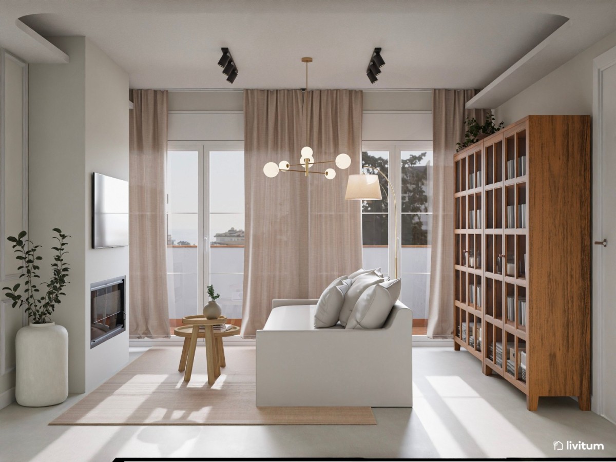 zona de descanso con sof&aacute; en tonos claros y mesa de centro de madera