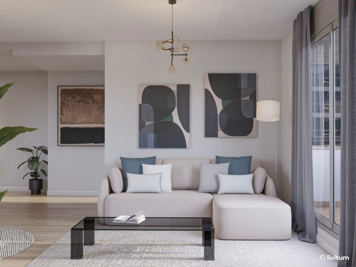sal&oacute;n en tonos azules oscuro, sof&aacute; en L y cuadros grandes