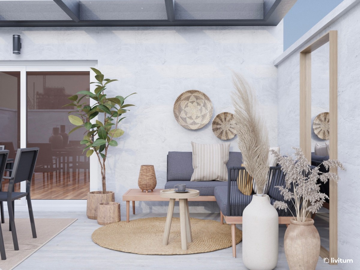 terraza con zona de descanso, sof&aacute;s y mesa de centro