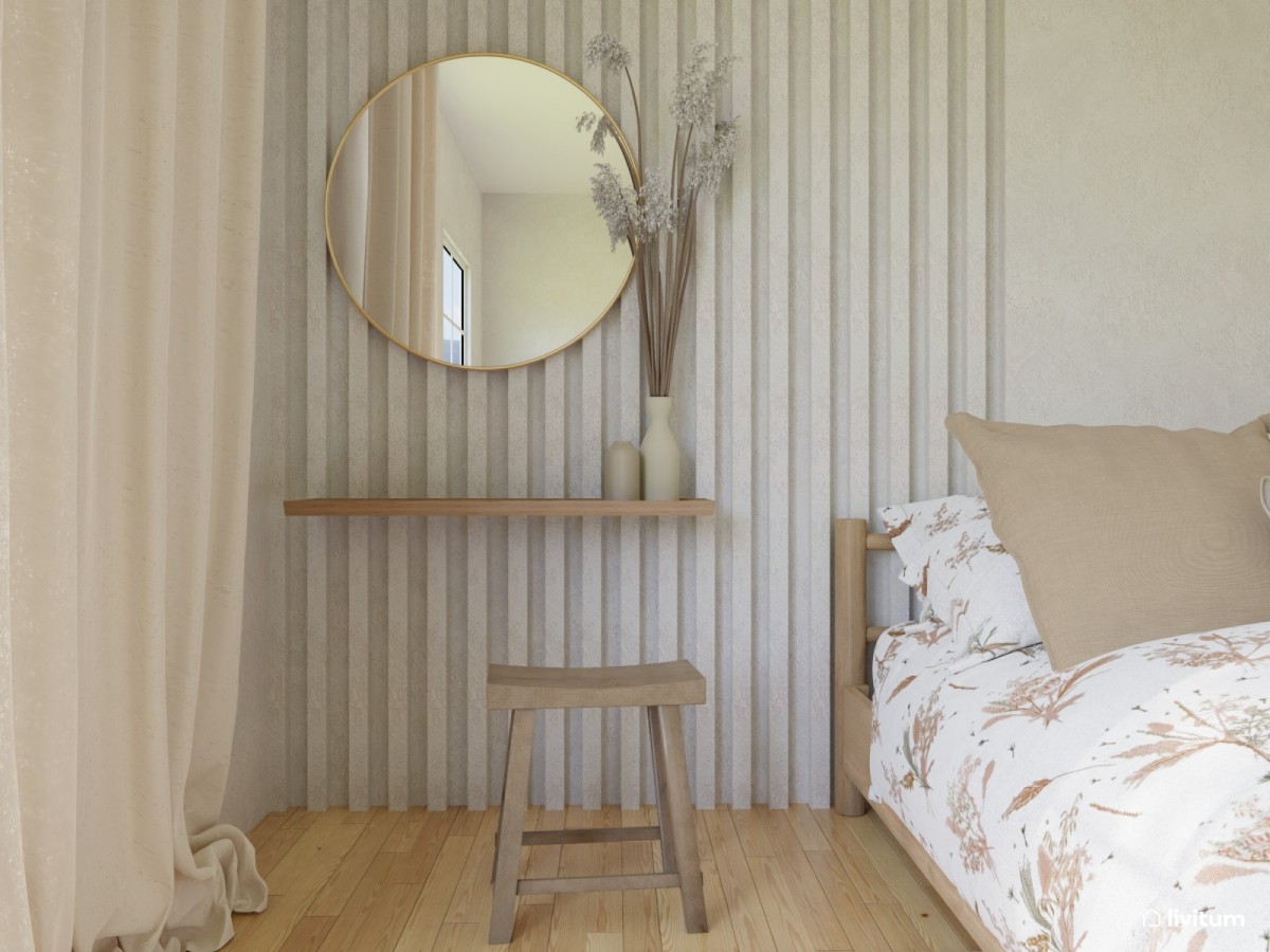 Dormitorio en tonos claros tabla y taburete en tonos tierra y espejo circular