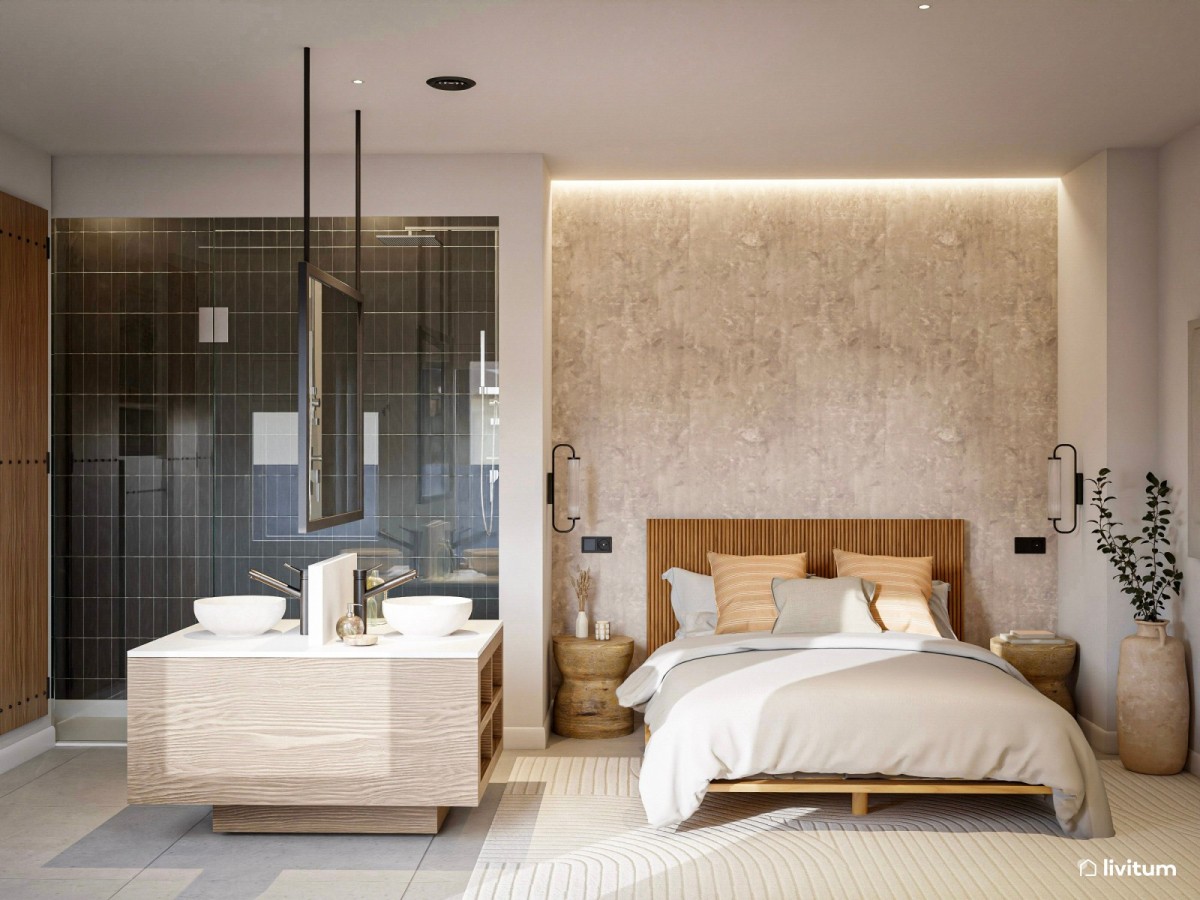 dormitorio con ba&ntilde;o integrado y pared de m&aacute;rmol