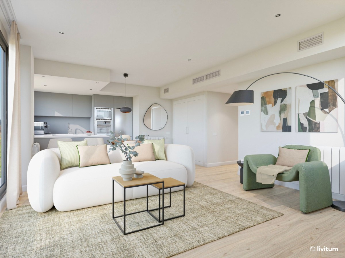 sal&oacute;n claro con sof&aacute; blanco y sill&oacute;n verde de forma org&aacute;nica