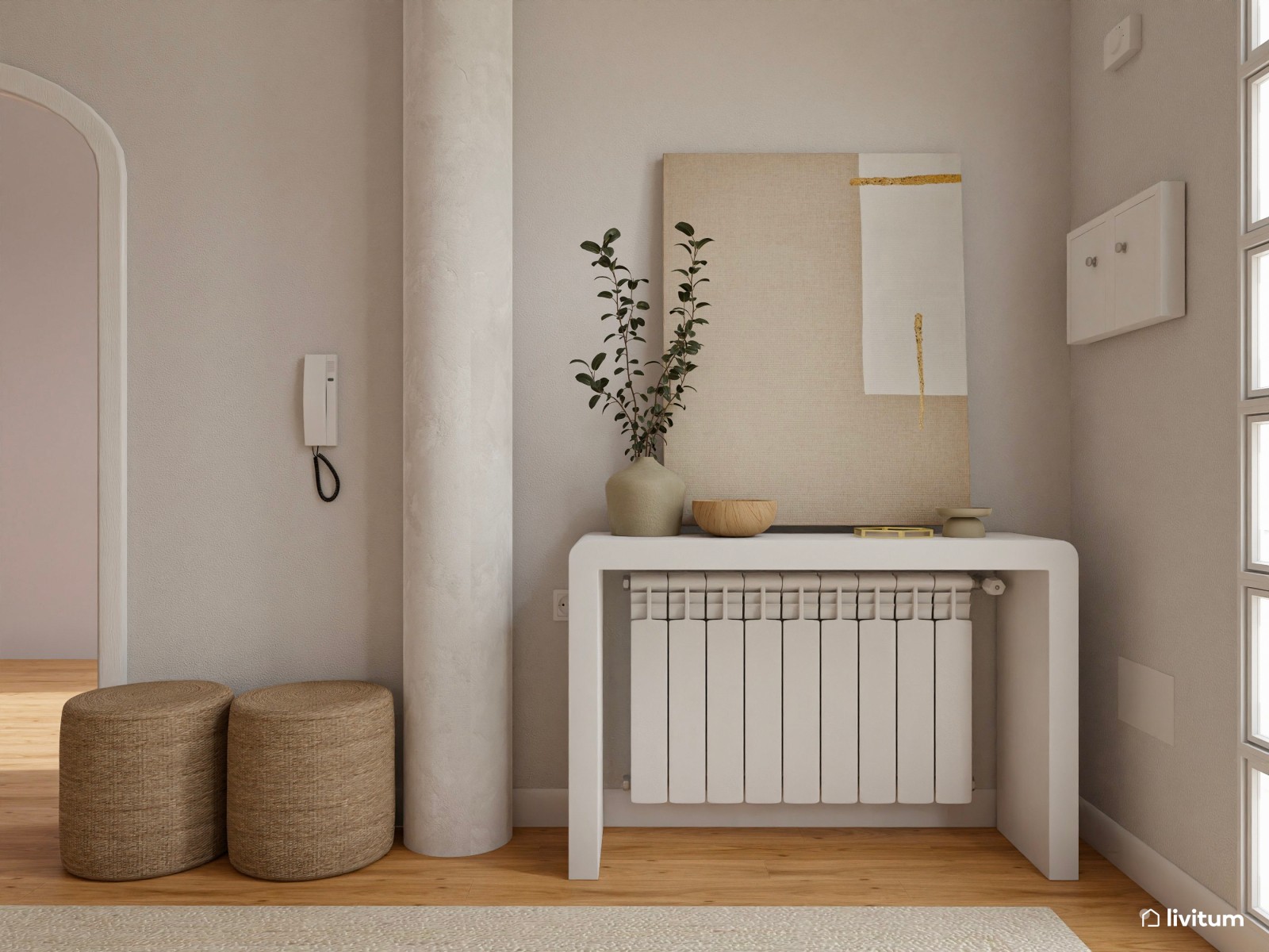 Cálido recibidor en tonos tierra con detalles en fibras naturales