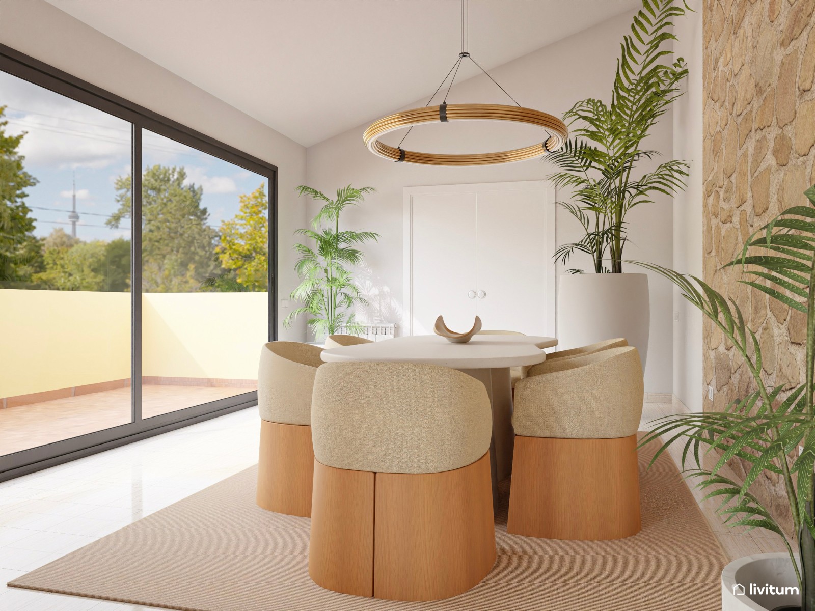 Comedor moderno con luz natural, pared de piedra y muebles originales