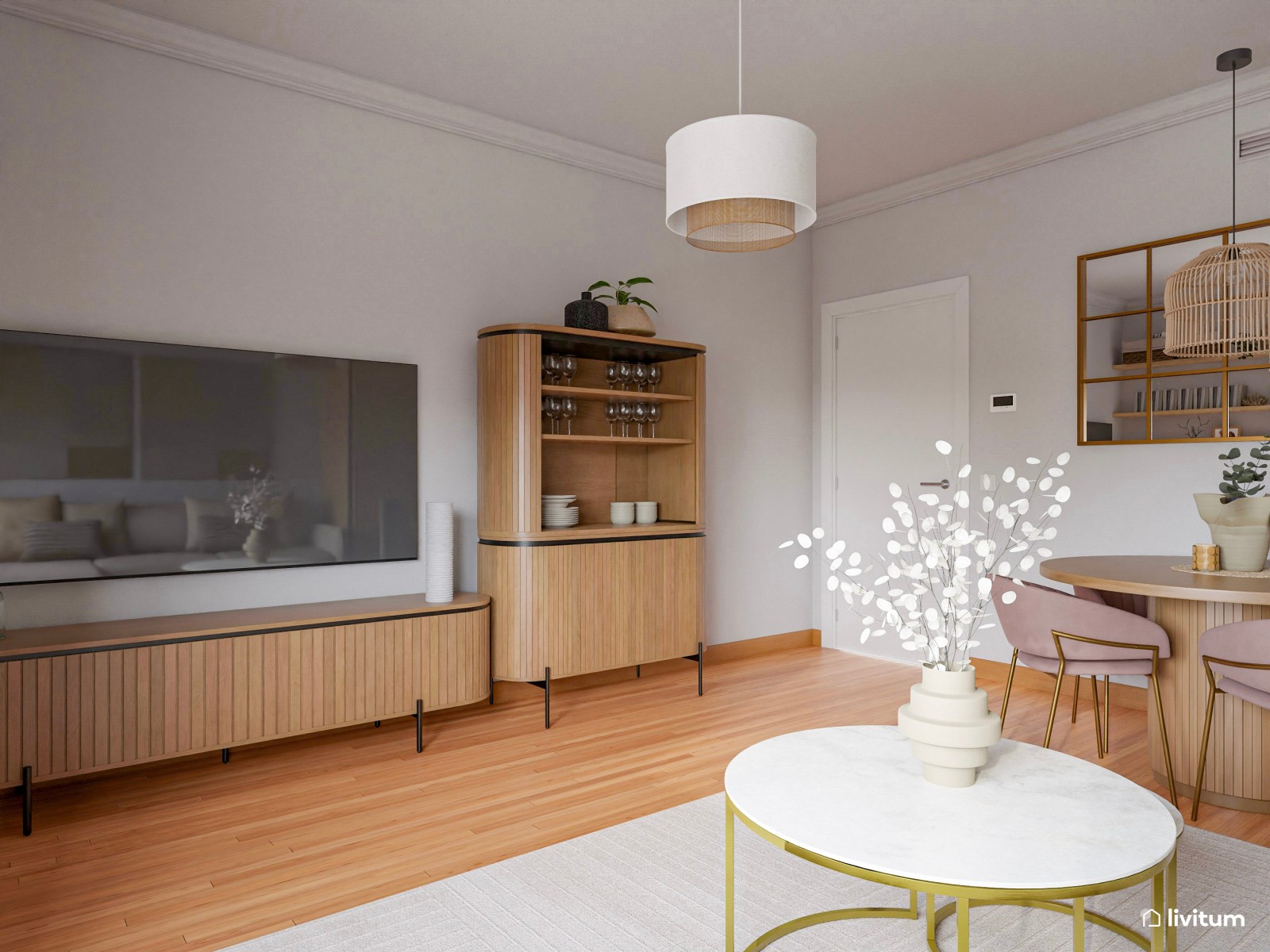 Coqueto salón comedor de 17,6 m² con detalles en dorado y rosa