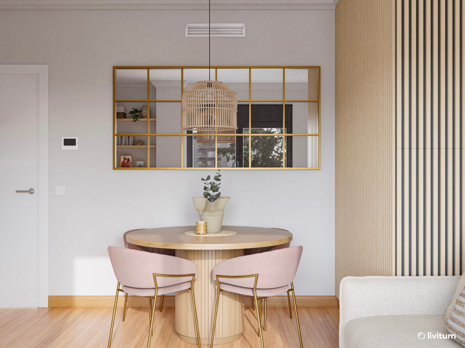 Coqueto salón comedor de 17,6 m² con detalles en dorado y rosa