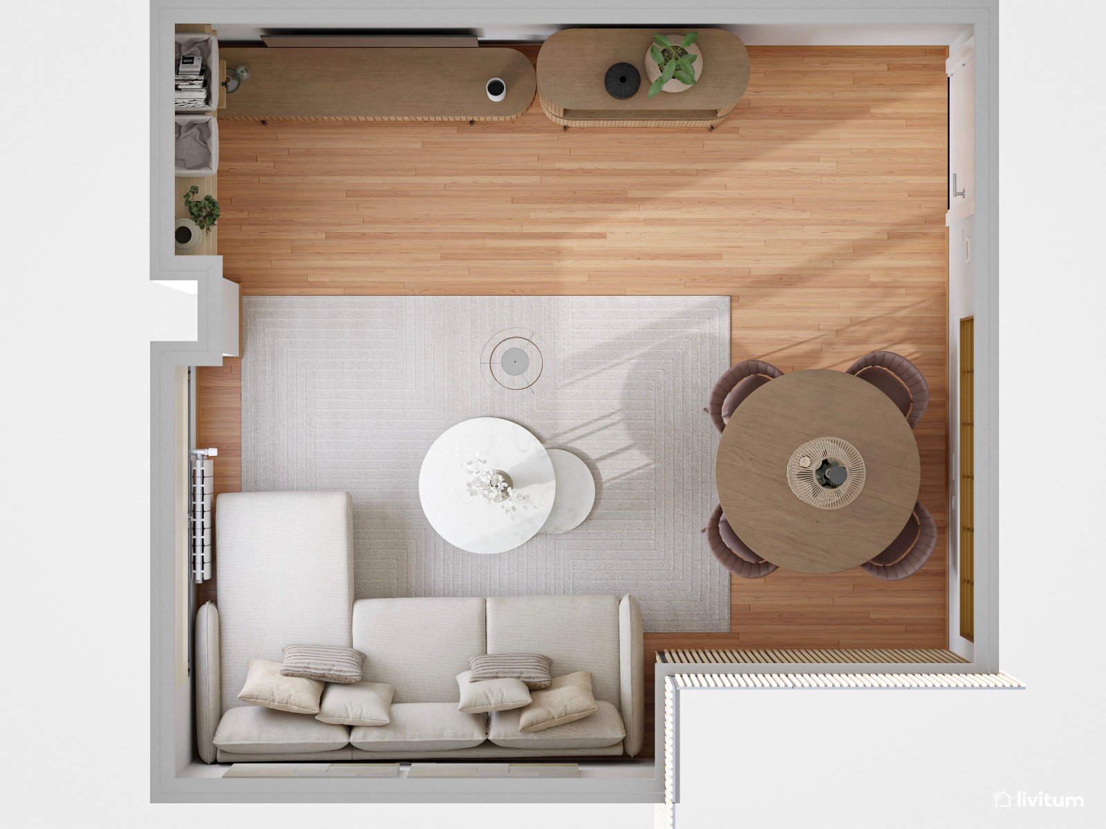 Coqueto salón comedor de 17,6 m² con detalles en dorado y rosa