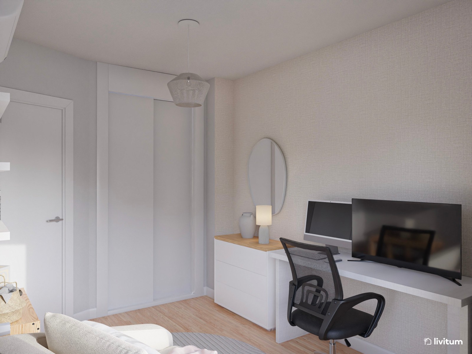 Despacho en tonos claros y con un sillón cama en blanco 