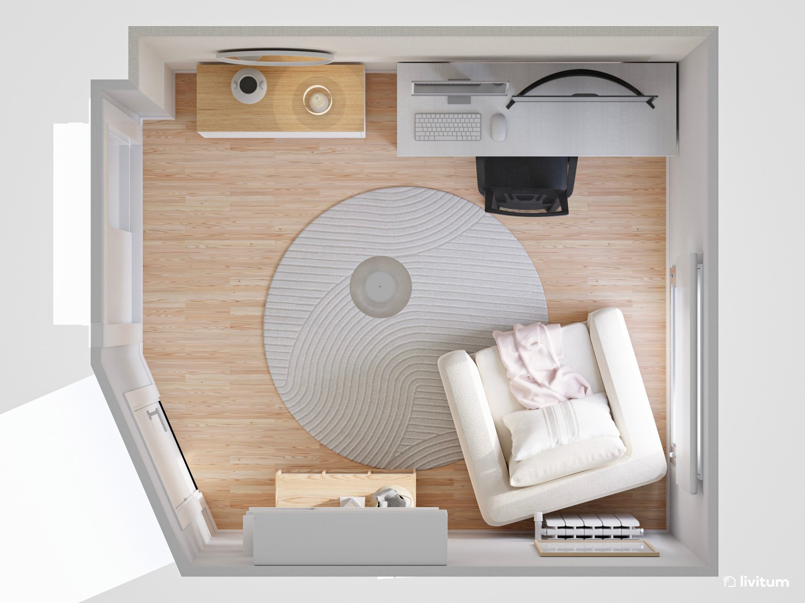 Despacho en tonos claros y con un sillón cama en blanco 