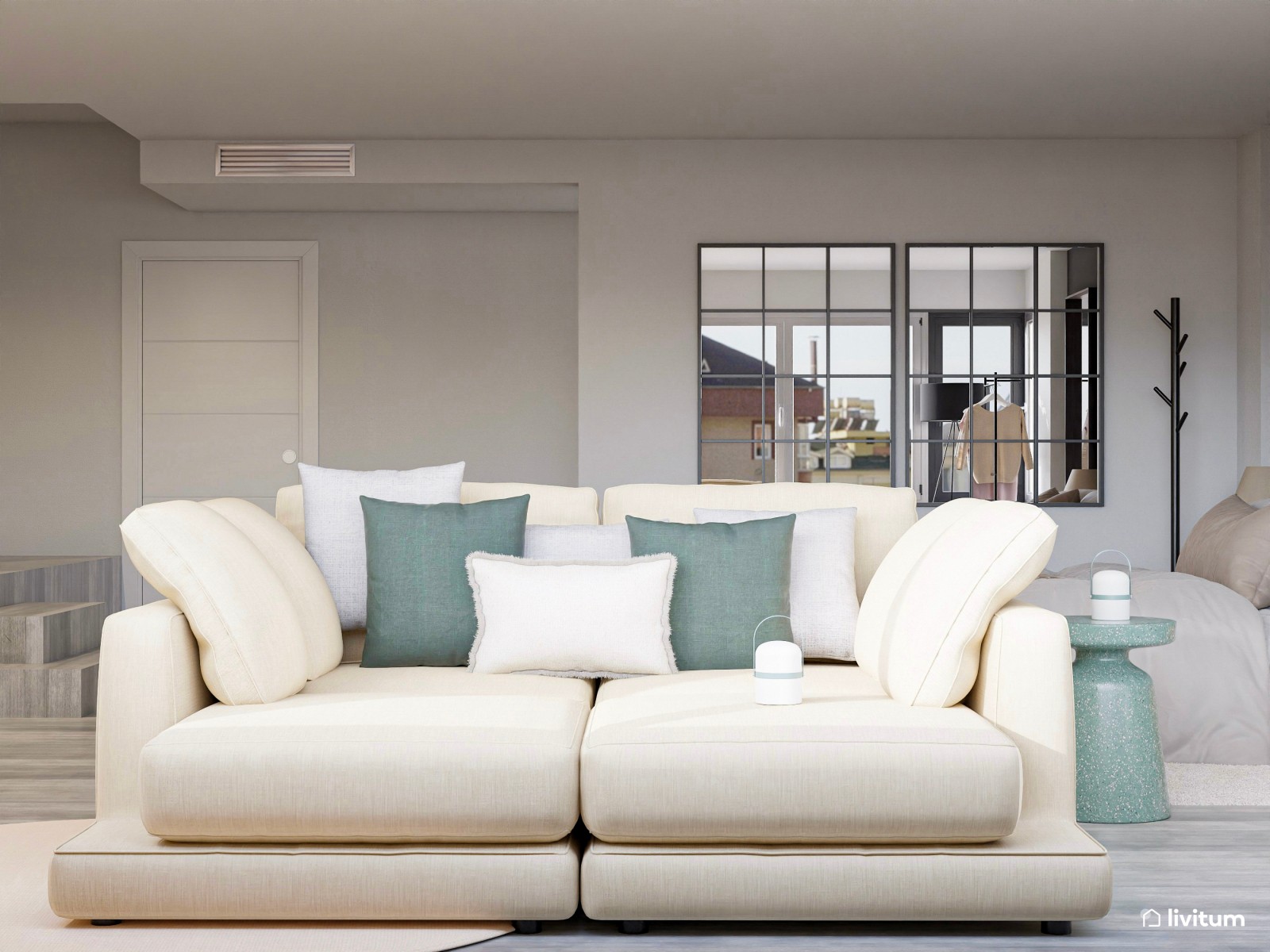 Dormitorio amplio y original con sofá y pared de acento en gris topo 