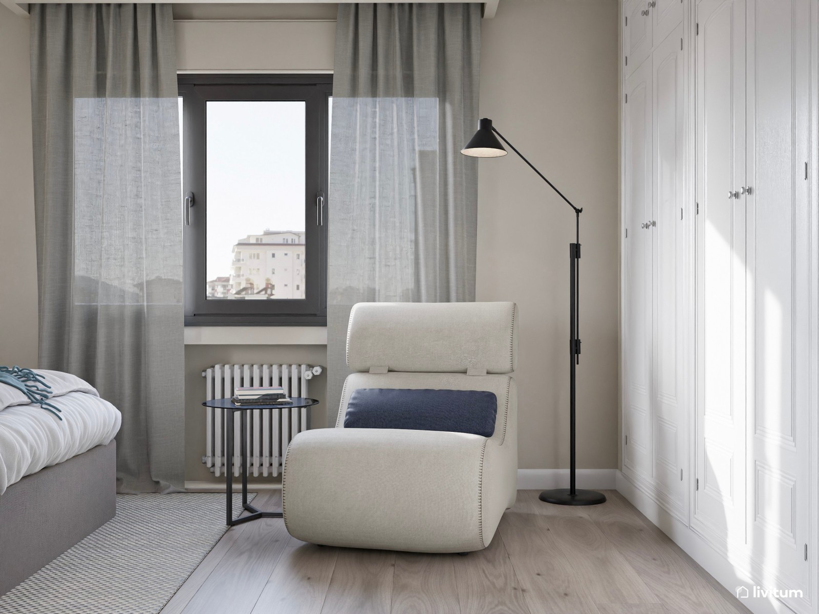 Dormitorio contemporáneo con acentos en gris oscuro y cómodo rincón de lectura