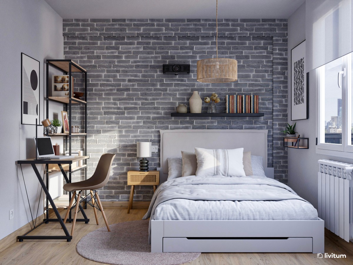 Dormitorio de estilo industrial con pared de ladrillos vistos
