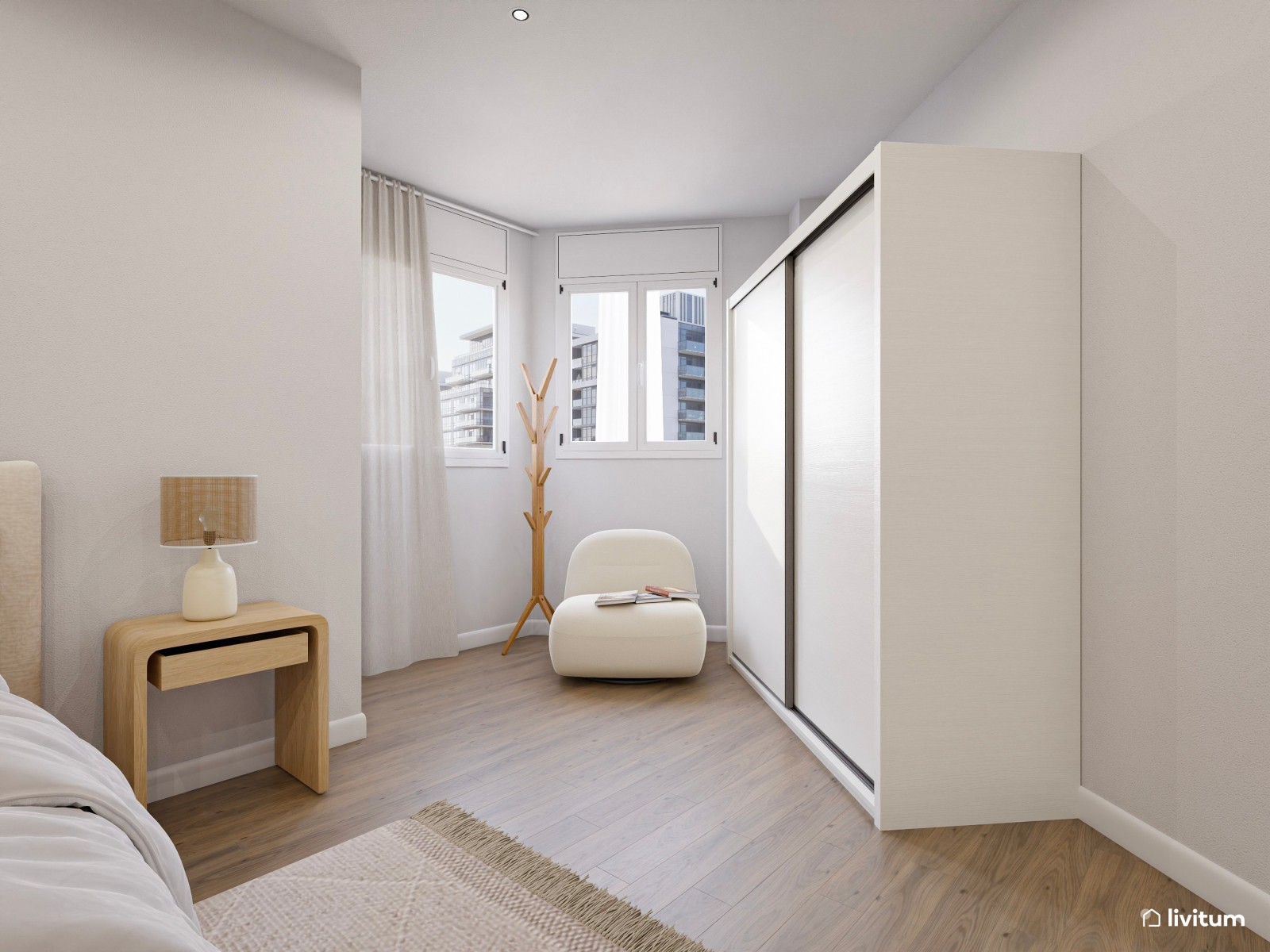 Dormitorio doble en planta irregular decorado en tonos claros y muebles de líneas suaves