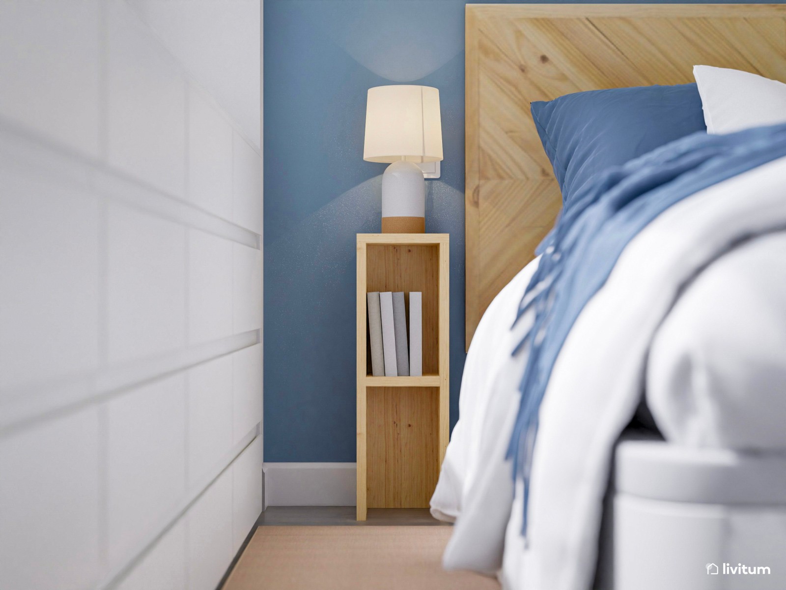 Dormitorio individual con cama doble y pared de acento en azul empolvado