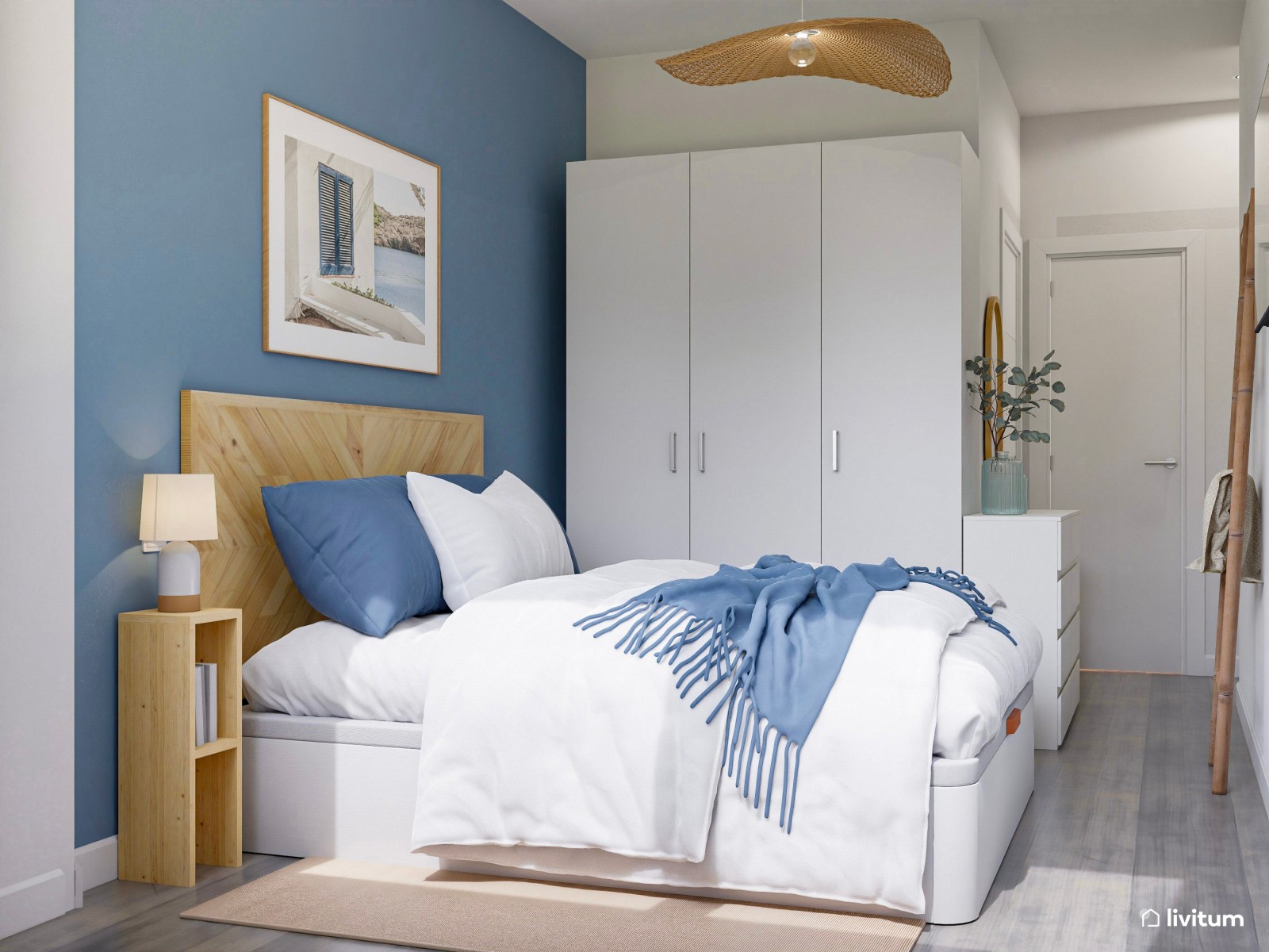 Dormitorio individual con cama doble y pared de acento en azul empolvado