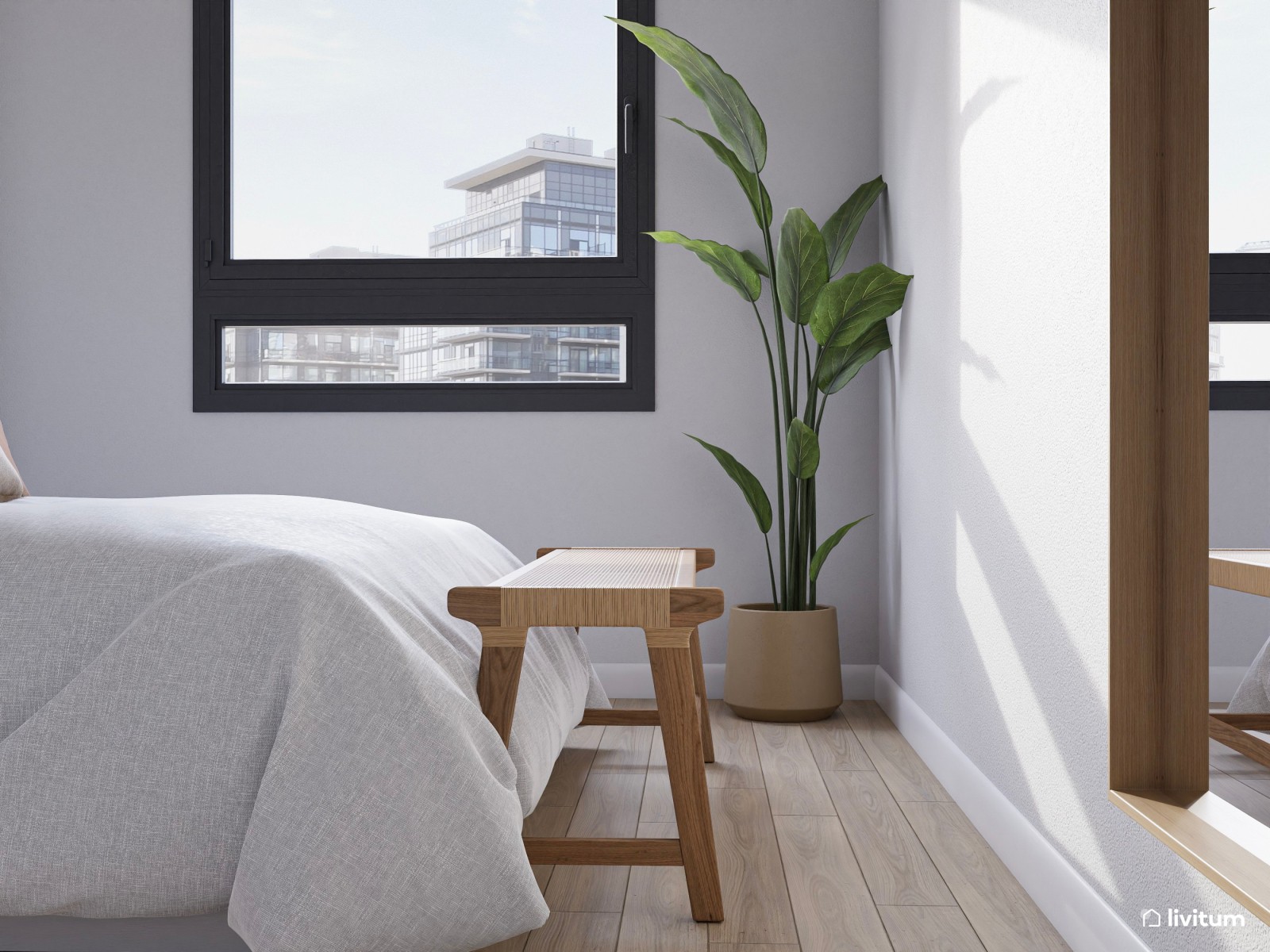 Dormitorio nórdico con pequeñas obras de arte y planta decorativa