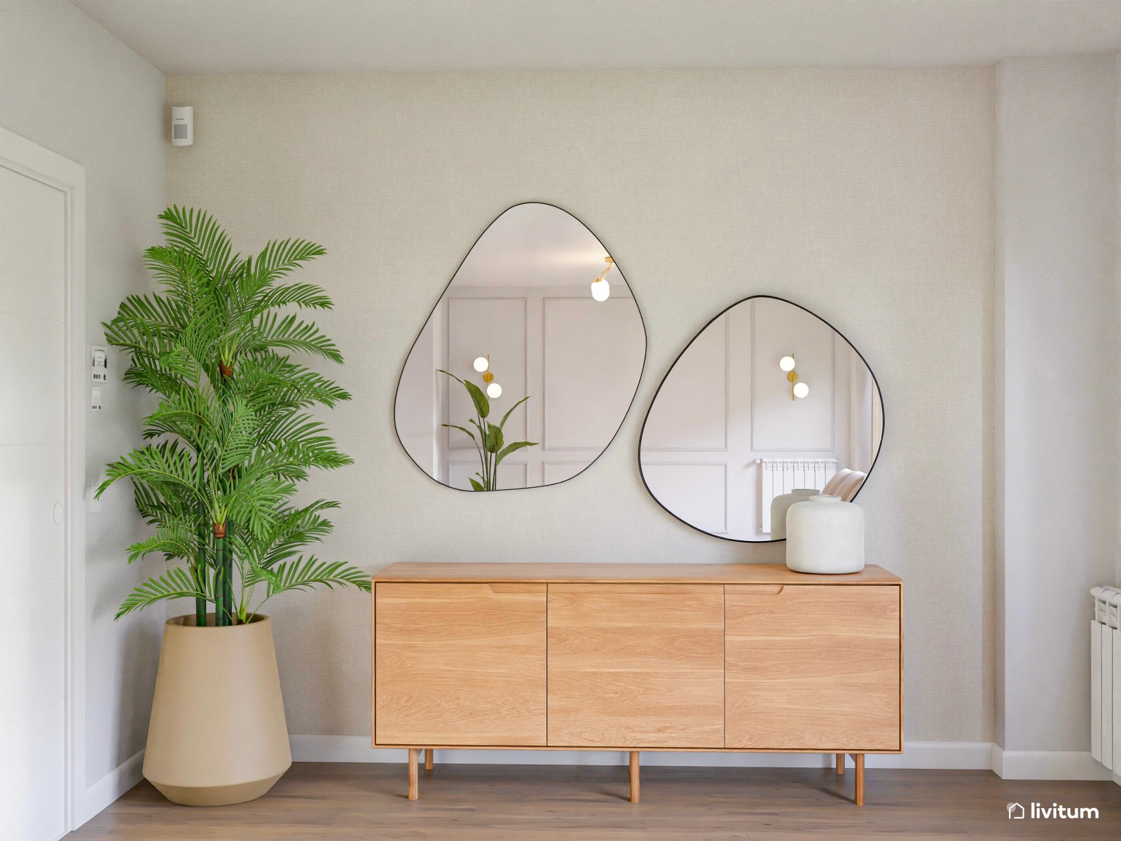 Elegante salón con muebles curvos y paredes con molduras