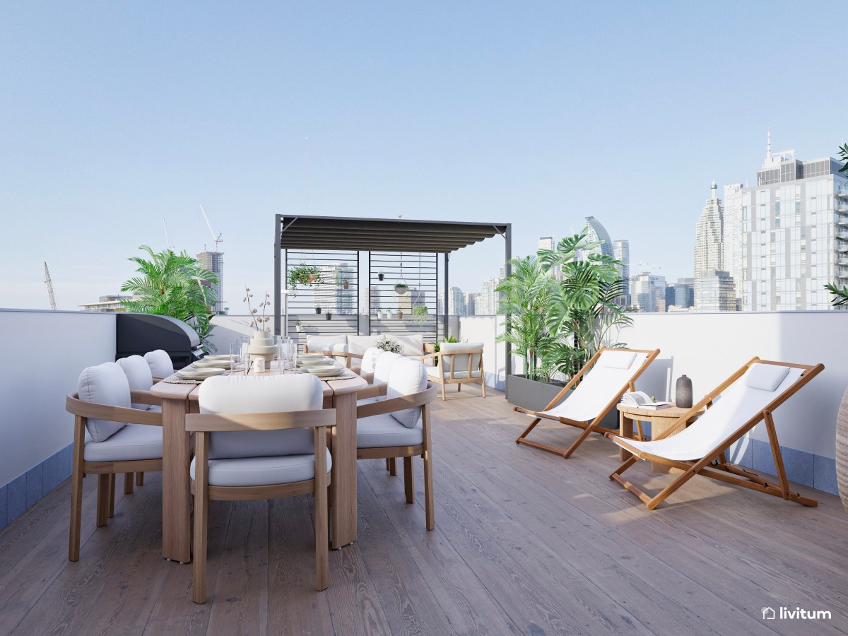 Espectacular terraza con pérgola de acero, zona de descanso y amplio comedor exterior