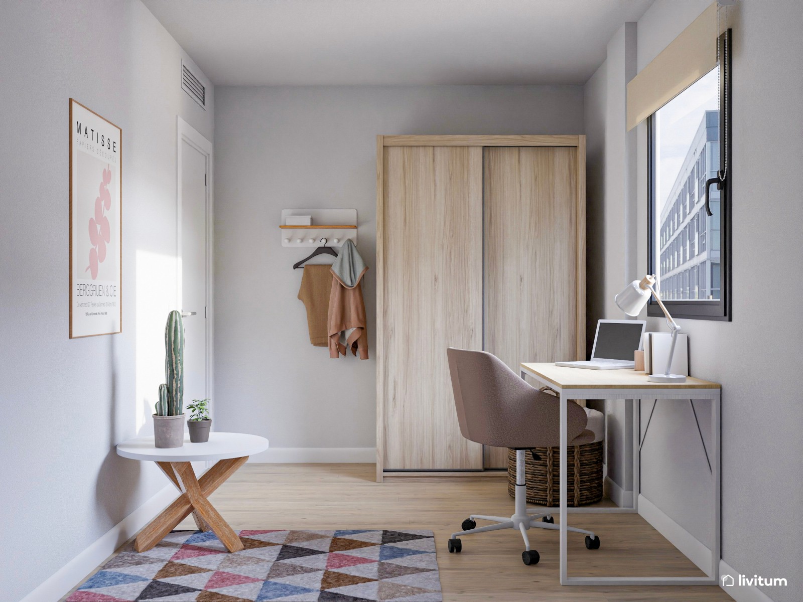Estudio con sofá cama y zona de despacho 