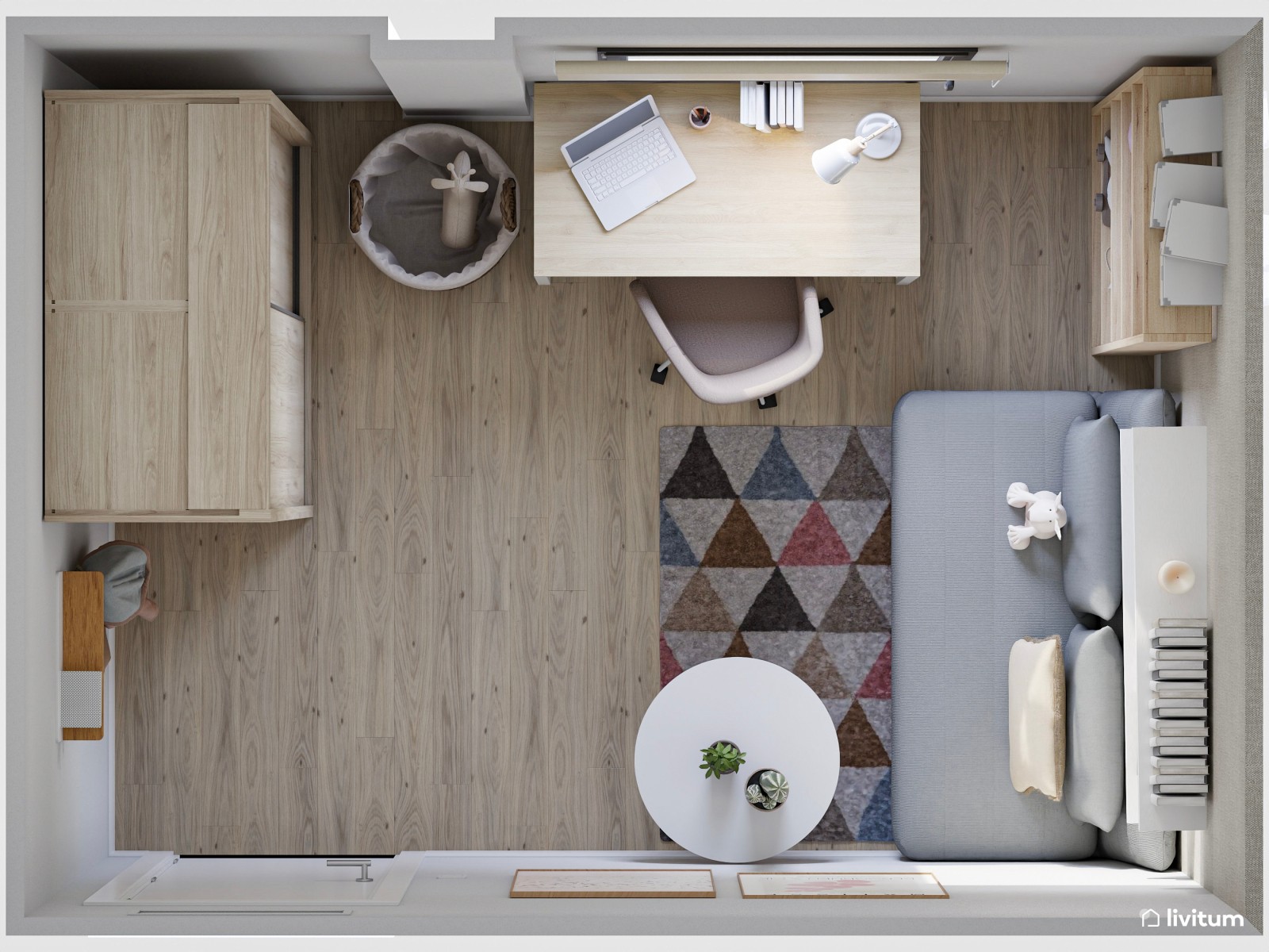 Estudio con sofá cama y zona de despacho 