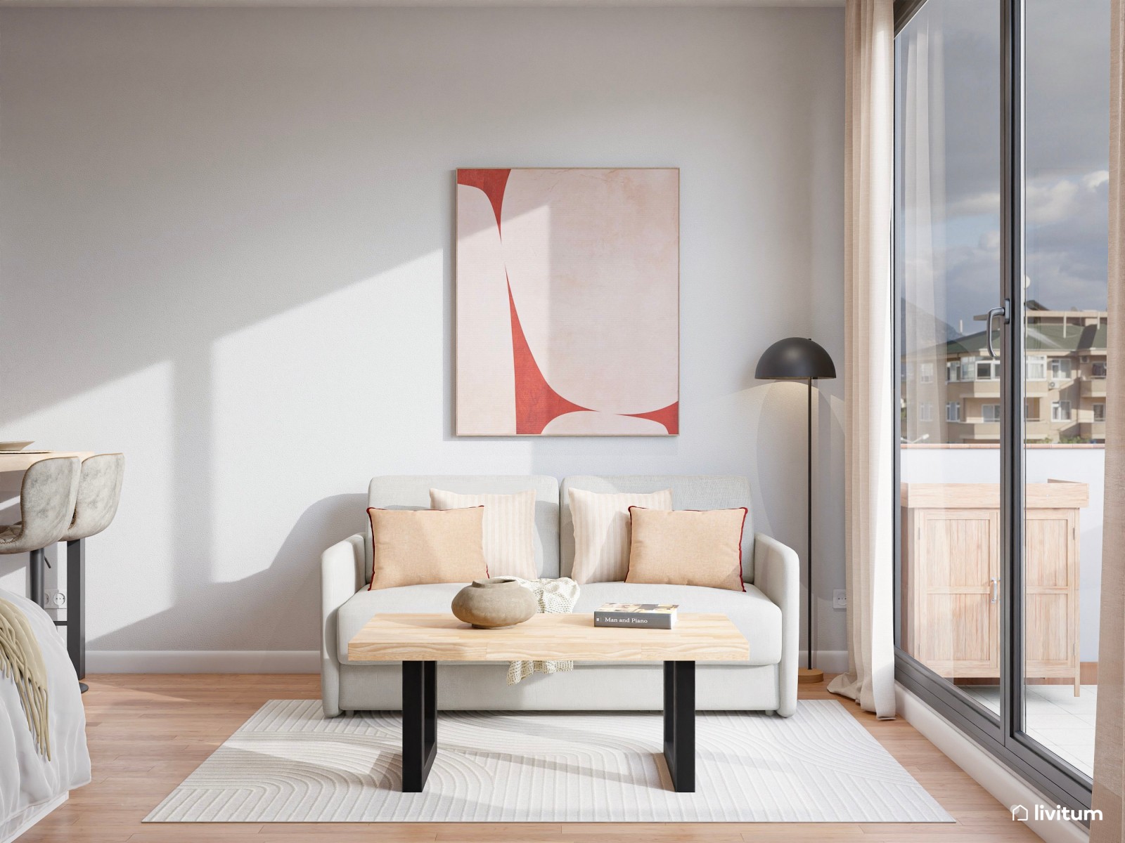 Estudio contemporáneo en colores claros con acentos en rojo, negro y madera