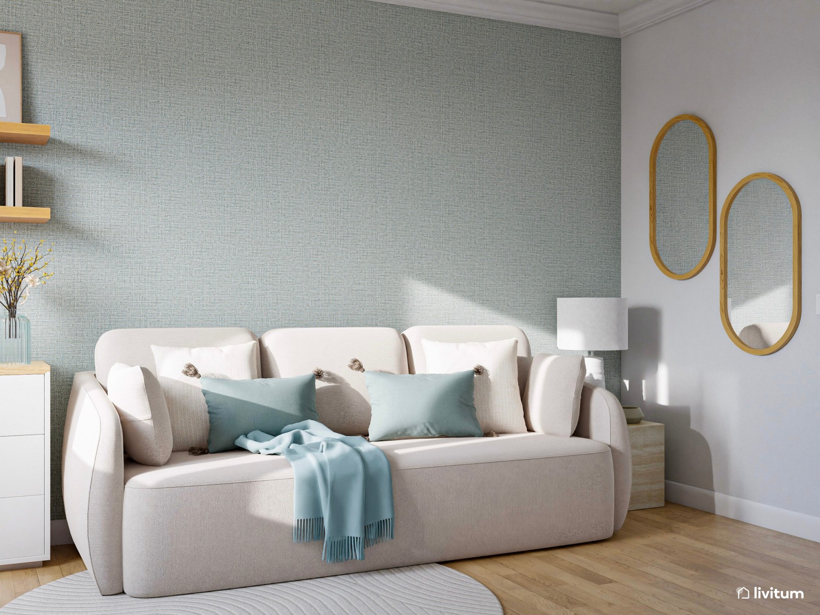Habitación de invitados con papel pintado verde y sofá cama 