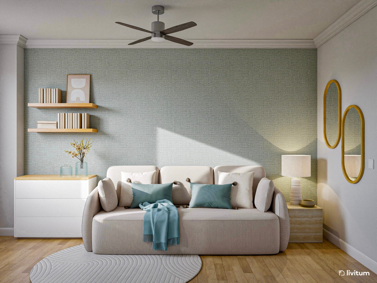 Habitación de invitados con papel pintado verde y sofá cama