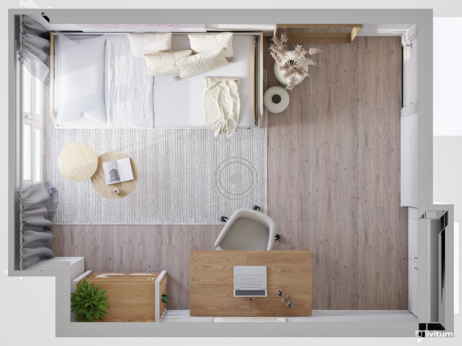 Habitación invitados con zona de trabajo decorada en tonos claros 